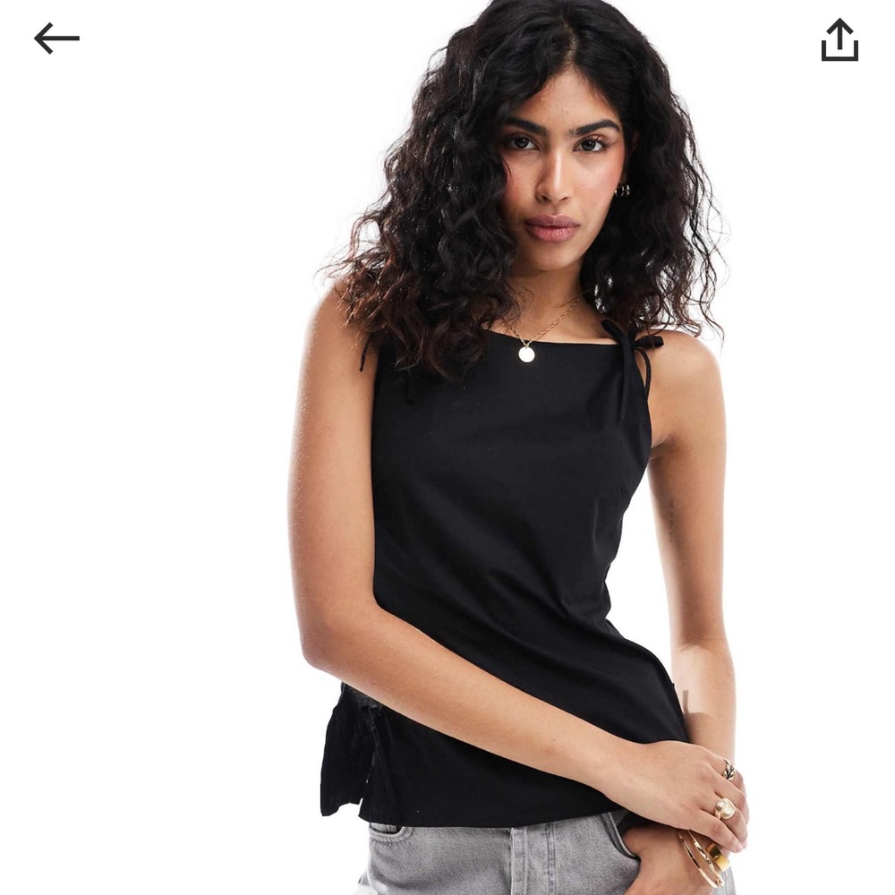 Black Slash neck top with bow details